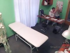 Busty blonde without bra flashing doctor